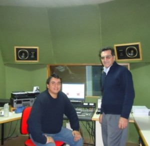 Eduardo (right) with the director of a Christian radio station